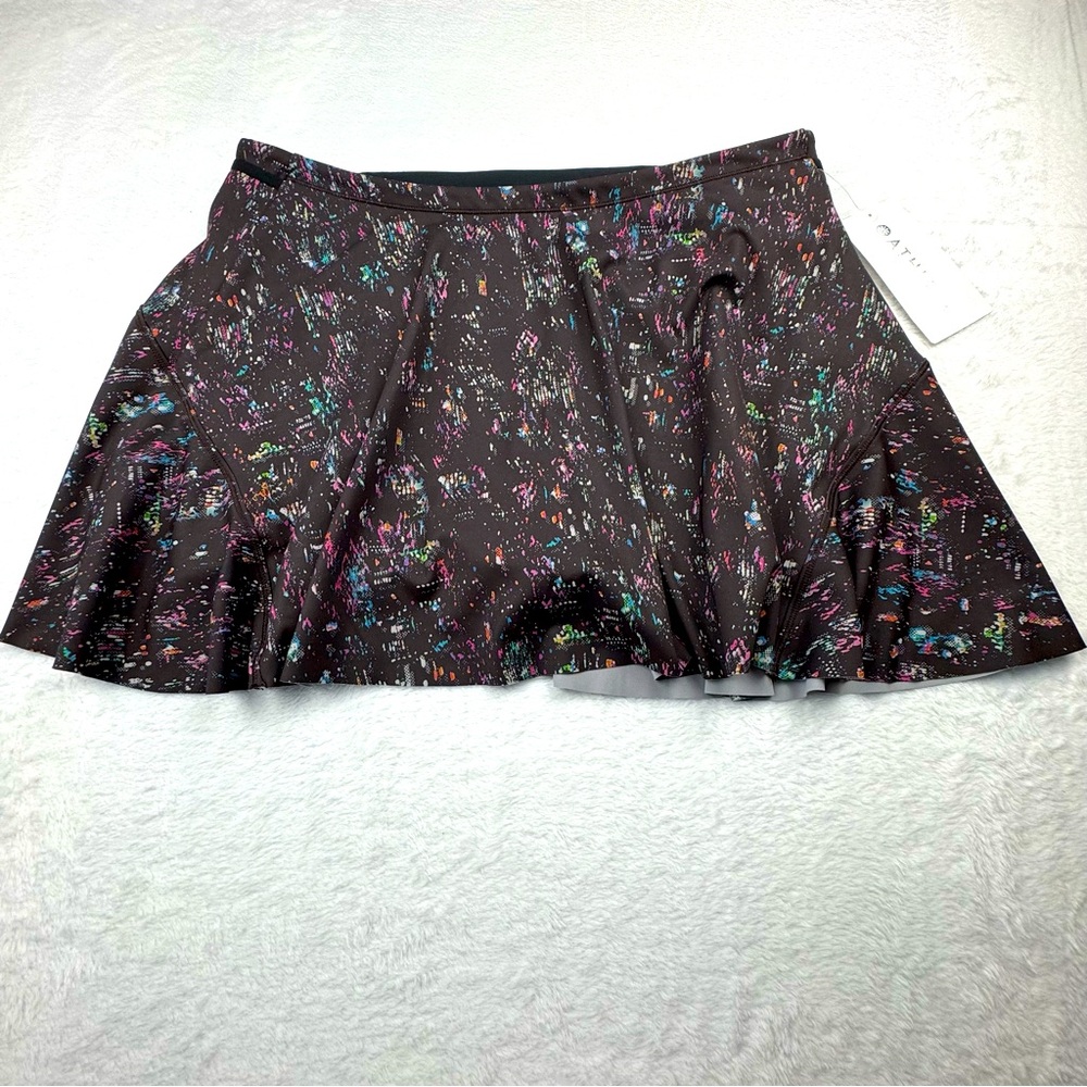 Athleta NWT Match Point Skort 13.5”. Size L.
Brown/ Multi-Color. 5 pockets.